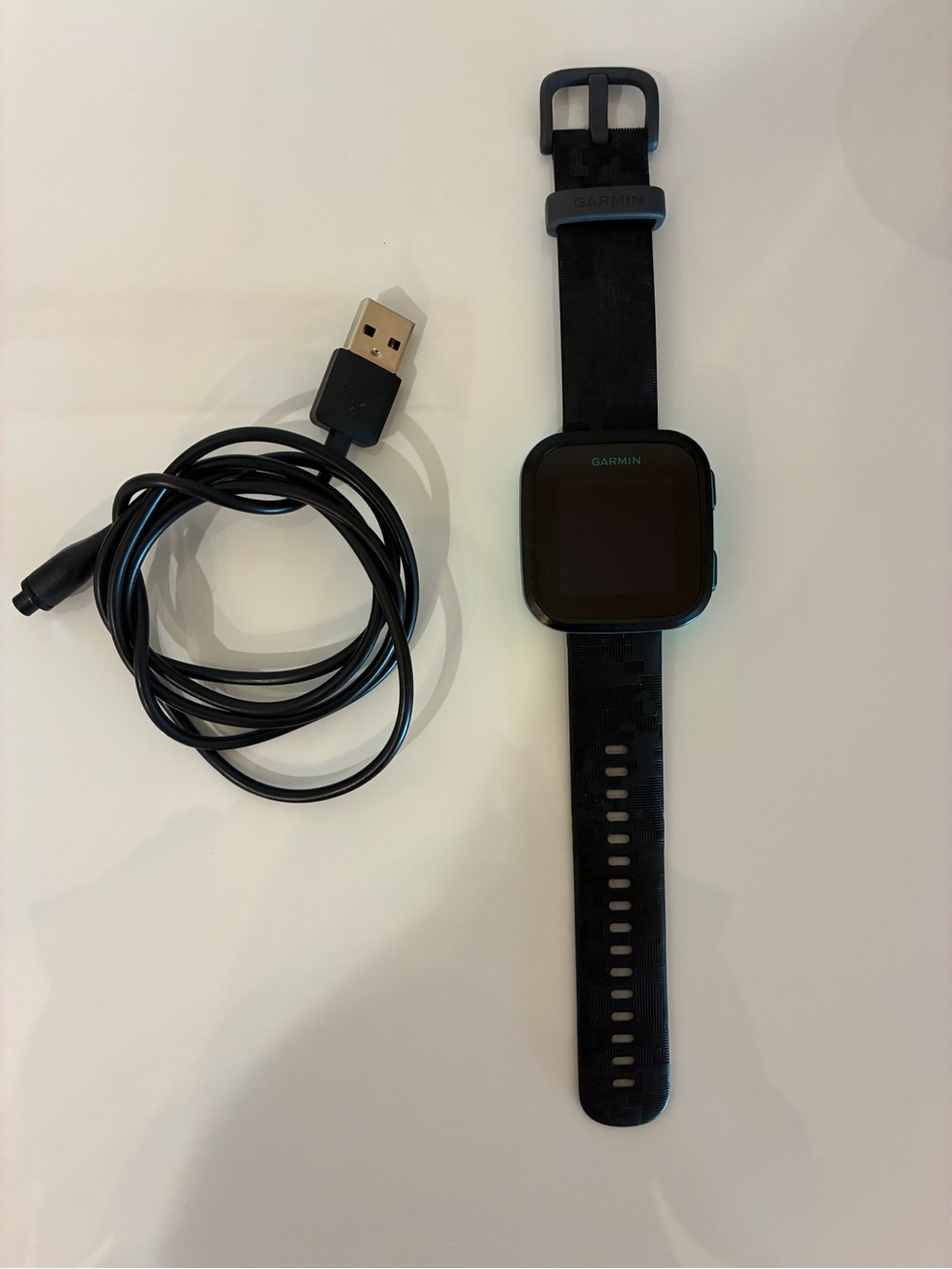 Garmin Bounce Black Fitness Smartwatch with Blue Trim and USB Cable
